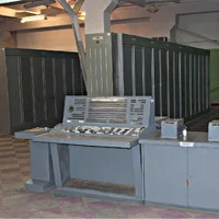 An extinct machine room with a K340A computer, 3 rows of cabinets and a remote control - this is the whole machine